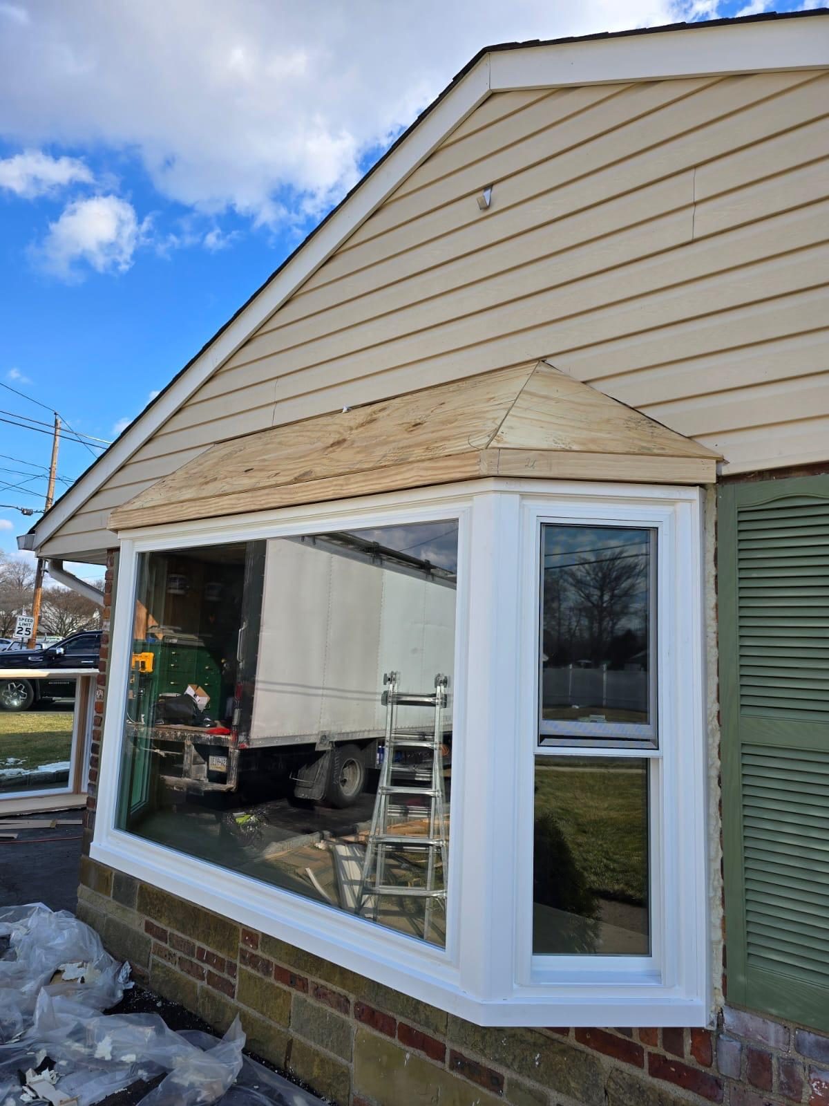 Picture Window Combination Installation Tri State picture window with flanking casement units for combined view and ventilation
